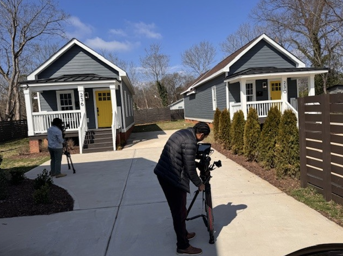 These historic shotgun houses have been relocated to Charlotte’s Lakeview community, near new construction homes with similar design elements.