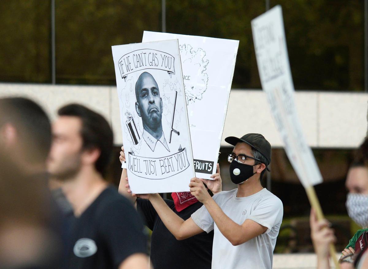 The crowd listens to a speaker at the Charlotte-Mecklenburg Government Center on Monday, June 8, 2020 as part of a gathering sponsored by Charlotte Uprising.