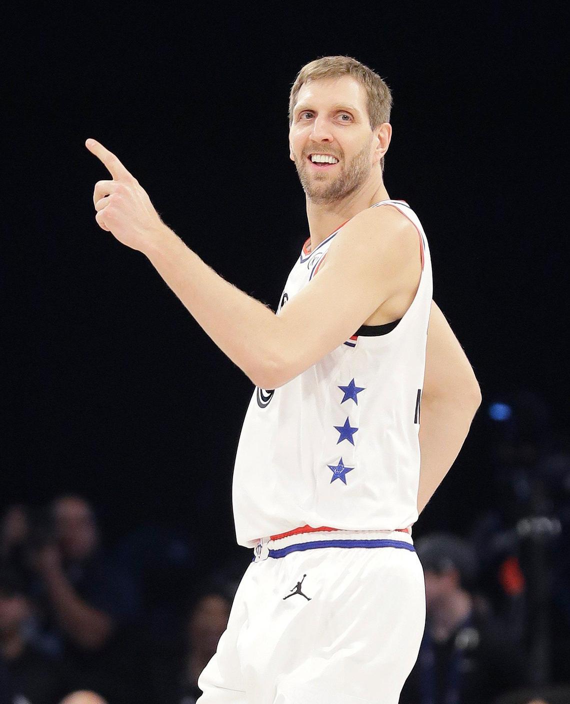 Team Giannis’ Dirk Nowitzki, of the Dallas Mavericks, celebrates his three-point shot against Team LeBron during the first half of an NBA All-Star basketball game, Sunday, Feb. 17, 2019, in Charlotte, N.C. (AP Photo/Chuck Burton)