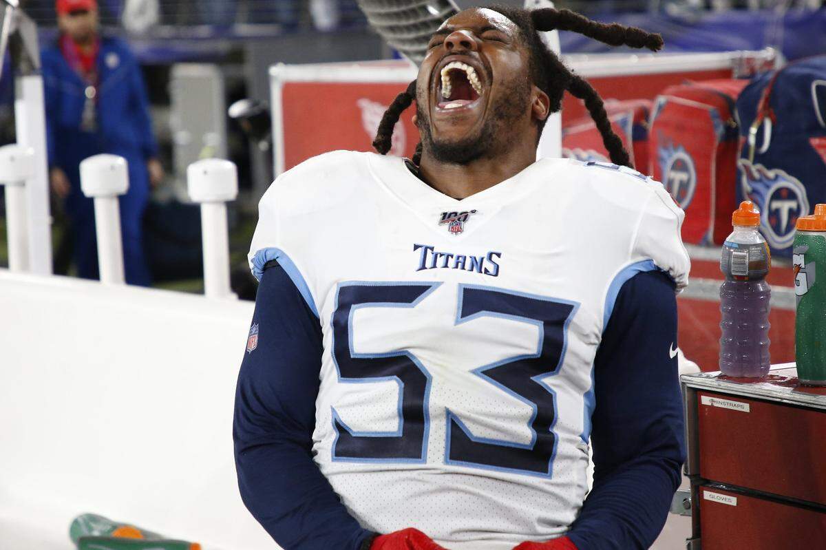Jan 11, 2020; Baltimore, Maryland, USA; Tennessee Titans linebacker Daren Bates (53) celebrates on the bench against the Baltimore Ravens in the final minute of the fourth quarter in a AFC Divisional Round playoff football game at M&T Bank Stadium. Mandatory Credit: Geoff Burke-USA TODAY Sports