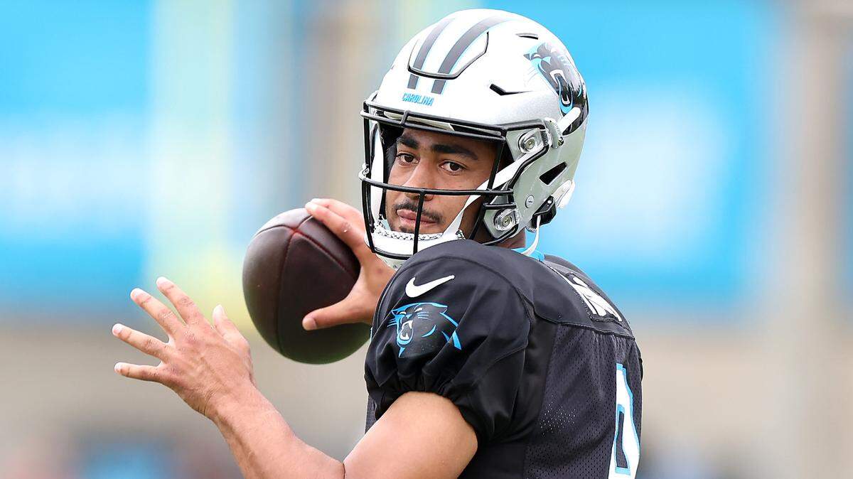 Carolina Panthers quarterback Bryce Young drops back to pass during practice on Tuesday, August 6, 2024.