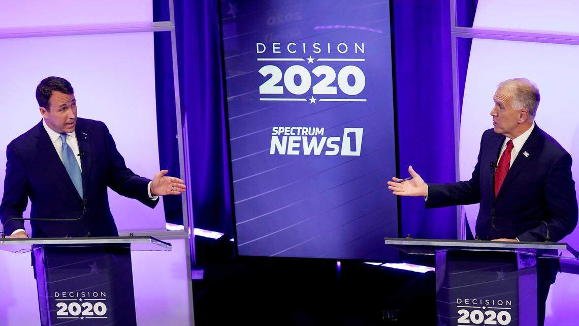 Democratic challenger Cal Cunningham, left, and U.S. Sen. Thom Tillis, R-N.C. talk during a televised debate Thursday, Oct. 1, 2020, in Raleigh, N.C.