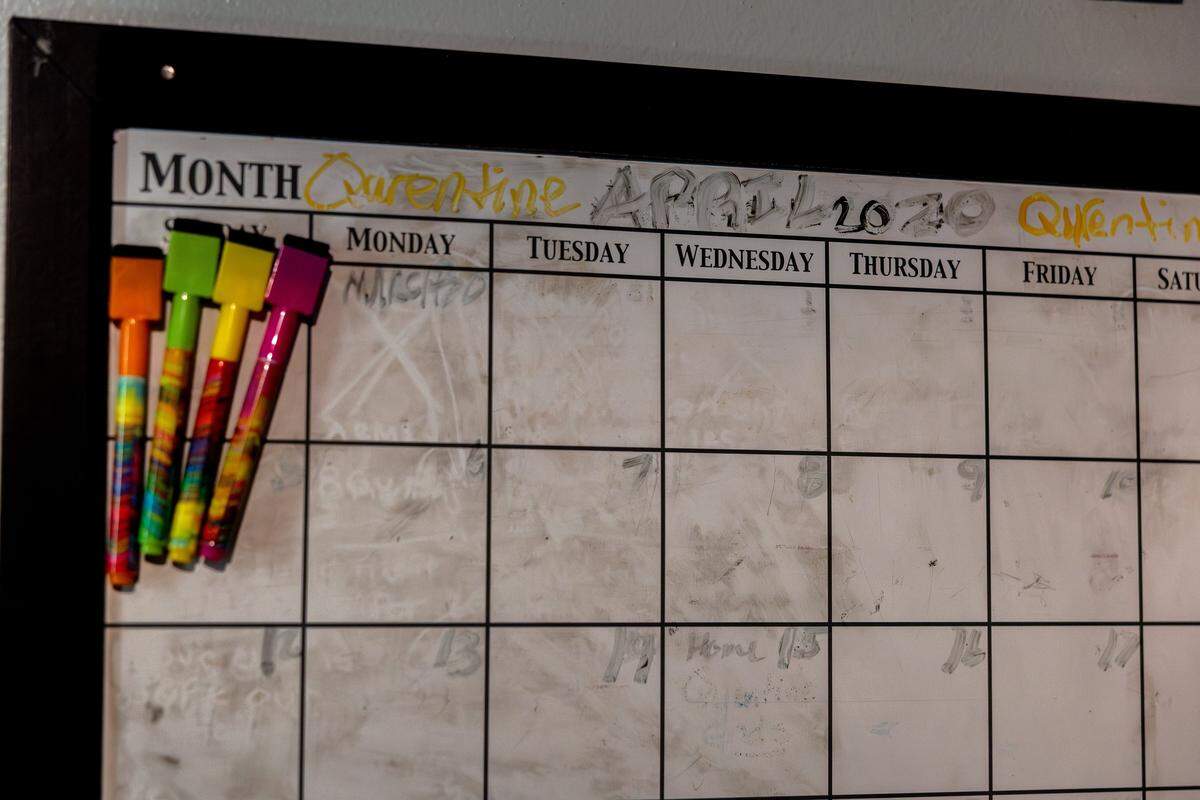 A calendar with “April 2020” written at the top in Mary Collins' room where she lived with her grandmother, Mia Alderman, in Charlotte, N.C., on Wednesday, September 24, 2025.