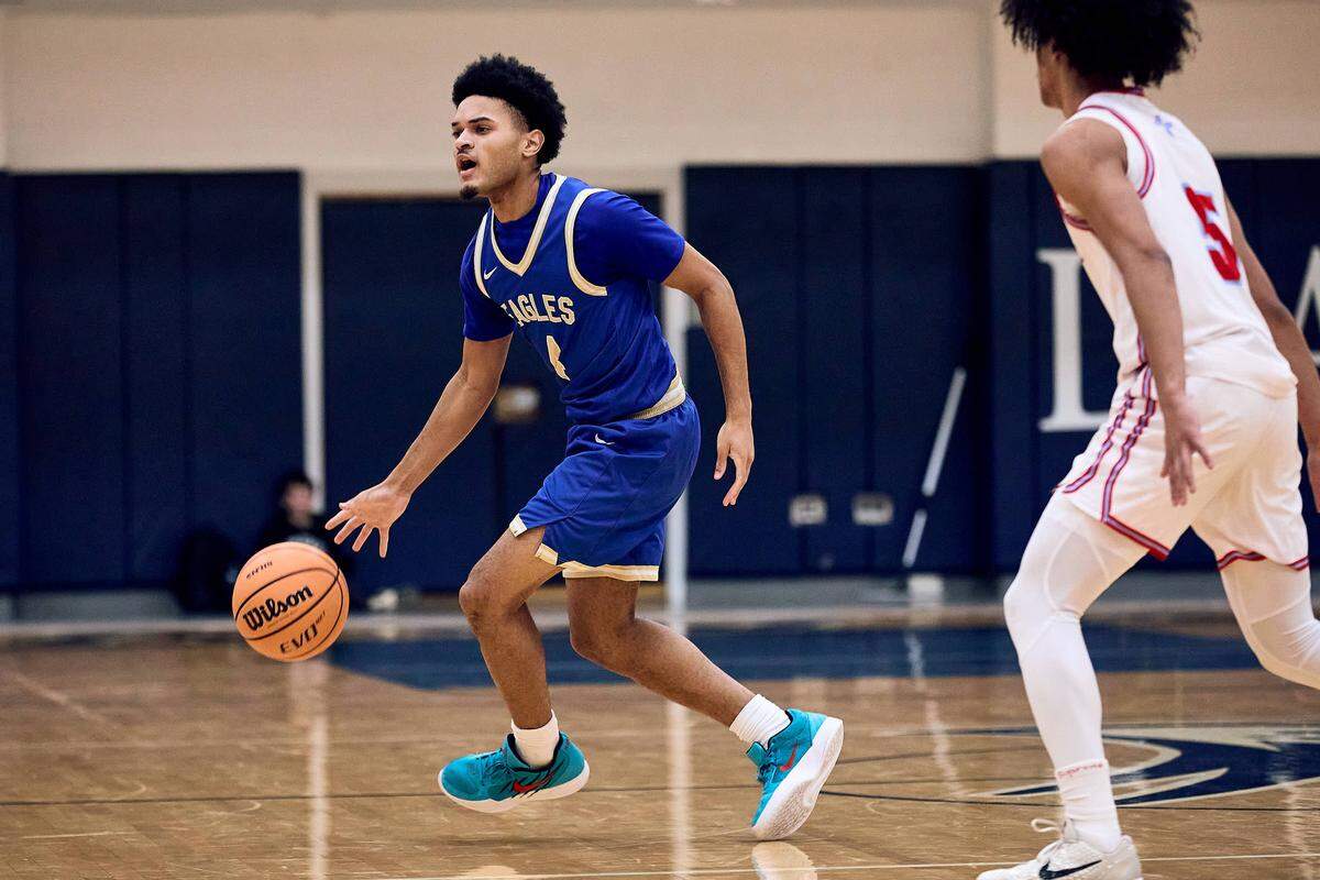 SouthLake Christian guard Anderson Johnson (4) paces the offensive possession in the second half of the 2025 Charlotte Latin Invitational Finals against Charlotte Catholic.