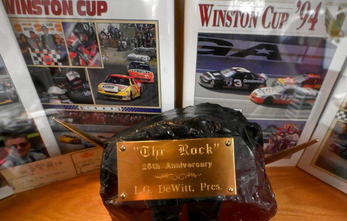 A piece of rock presented to former North Carolina Motor Speedway President L.G. DeWitt sits in a display case at his daughter Nancy Daughtry’s home. L.G. DeWitt is a former NASCAR Winston Cup Series stock car owner along with having been the President of North Carolina Motor Speedway. North Carolina Motor Speedway is known today as Rockingham Speedway aka. The Rock.