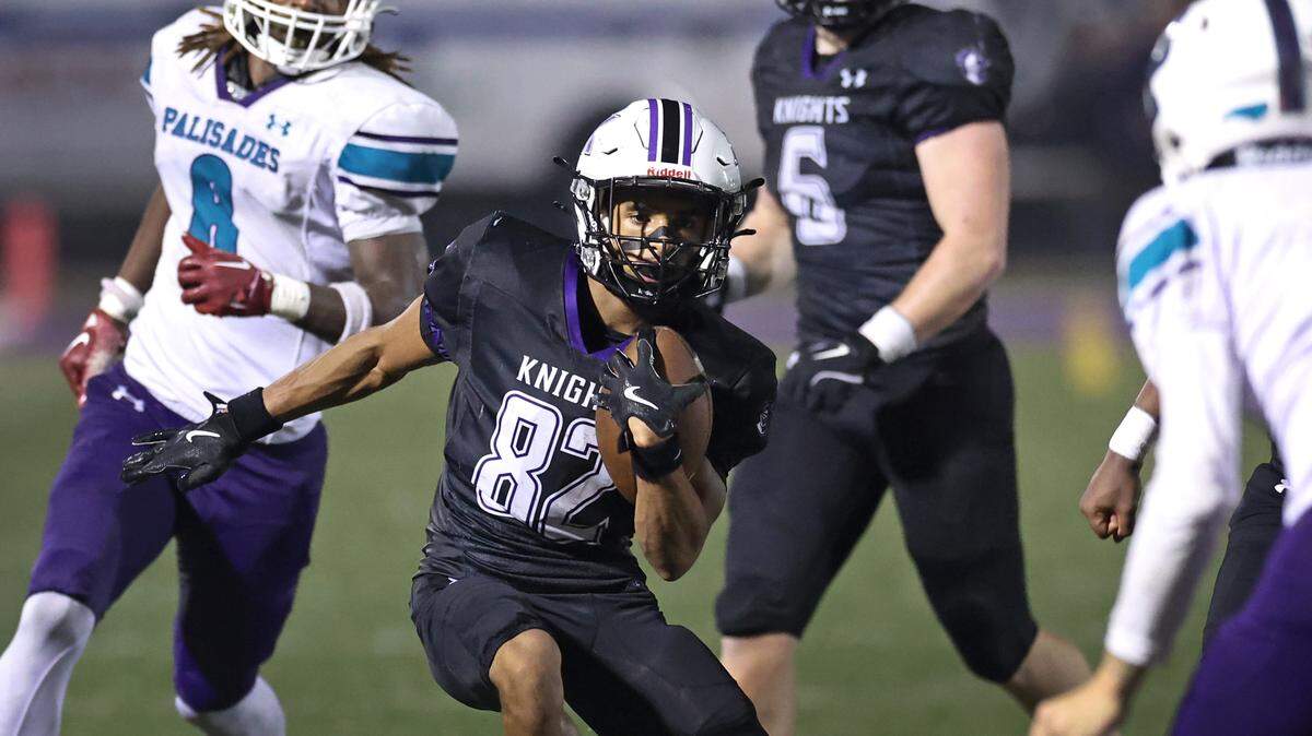 Ardrey Kell wide receiver Braxton Bethea picks up yardage during play against Palisades on Friday, November 1, 2024 at Ardrey Kell High School. Ardrey Kell defeated Palisades 13-9.