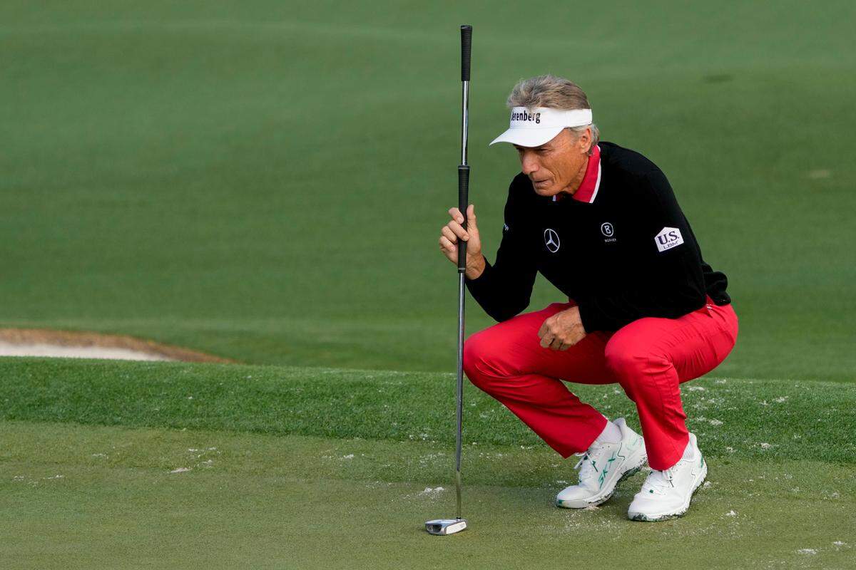 Bernhard Langer lines up his putt on no. 2 during the first round of the Masters Tournament.