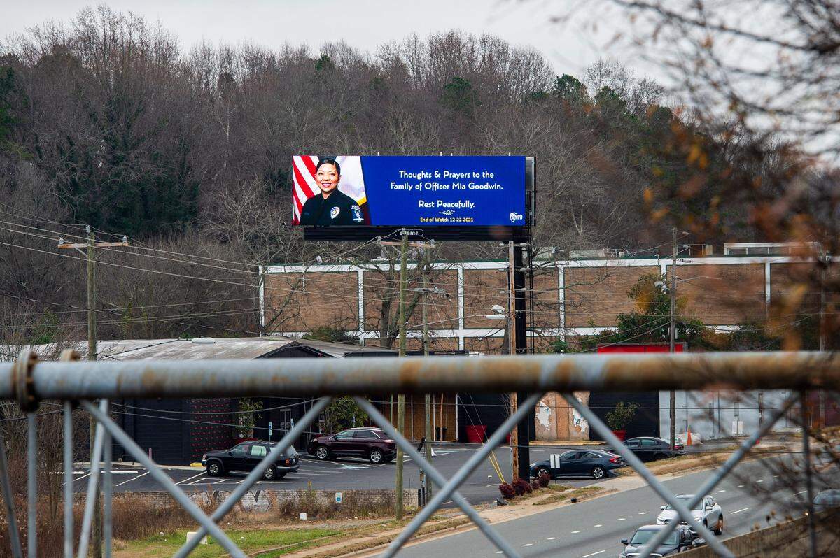 A tribute to the late CMPD Officer Mia Goodwin is seen on an electric billboard along East Independence Boulevard on Tuesday, December 28, 2021 in Charlotte, NC. Officer Goodwin was killed in a traffic incident on I-85 on December 22, 2021.