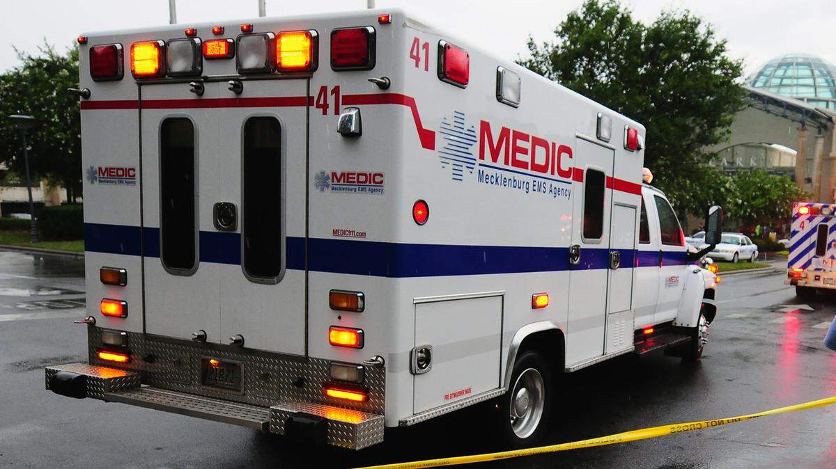 Medic told county commissioners Tuesday about a plan to use lights and sirens less often. In this photo, a Medic staffer arrives at SouthPark mall during a July 2012 incident.