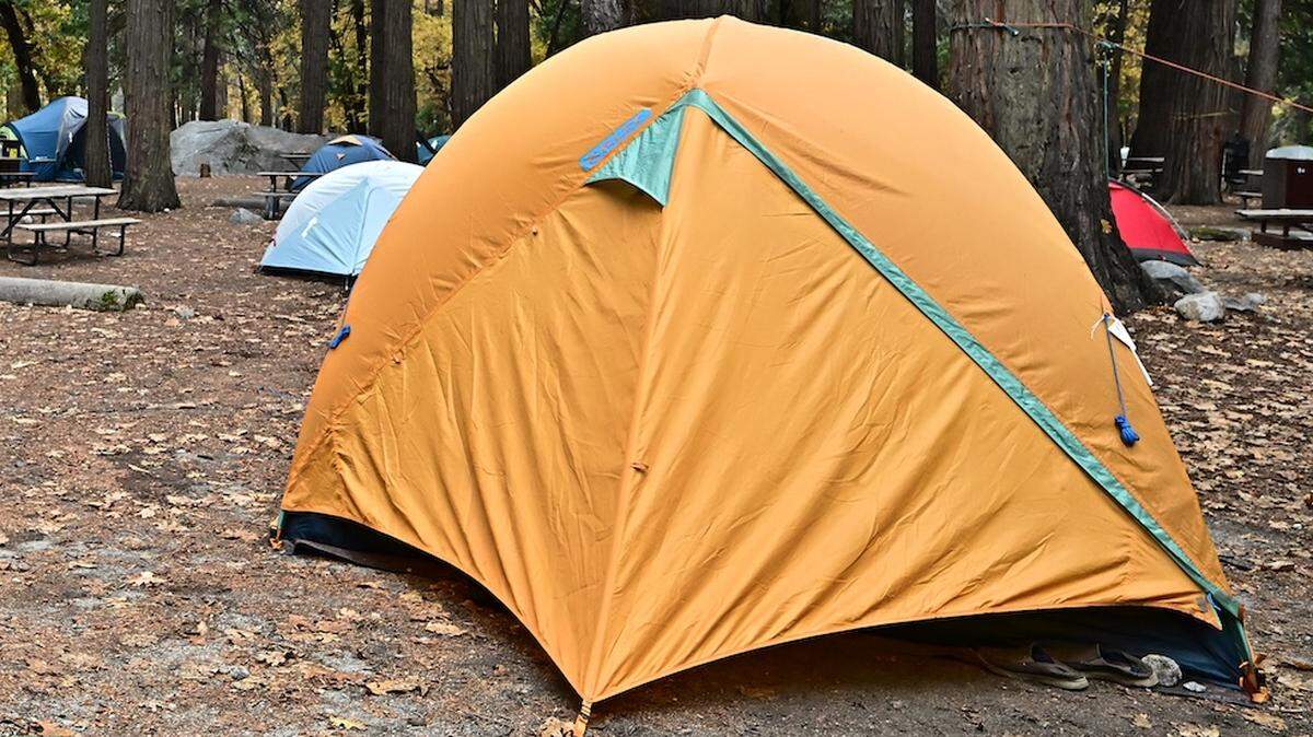 Bear-proof lockers, a proven method to prevent bears from accessing campers’ food, are seen next to tents at a Yosemite Valley campground in Yosemite National Park, California on October 25, 2025, amid the ongoing US government shutdown. Thousands of adrenaline junkies including BASE jumpers are flocking to California's Yosemite National Park, as the US government shutdown leaves park rangers short-staffed to cope at the world-renowned climbing destination.
The shutdown, which began on October 1 due to the budget impasse between Republicans and Democrats in Congress, has seen personnel levels plummet at this national park -- which is home to the imposing 3,000-foot granite wall known as El Capitan.
"We're challenged," a park ranger told AFP, on condition of anonymity.
"A lot of rangers have been furloughed" and those still working have had to contend with "an increase in illegal activity," he said. (Photo by Frederic J. BROWN / AFP)