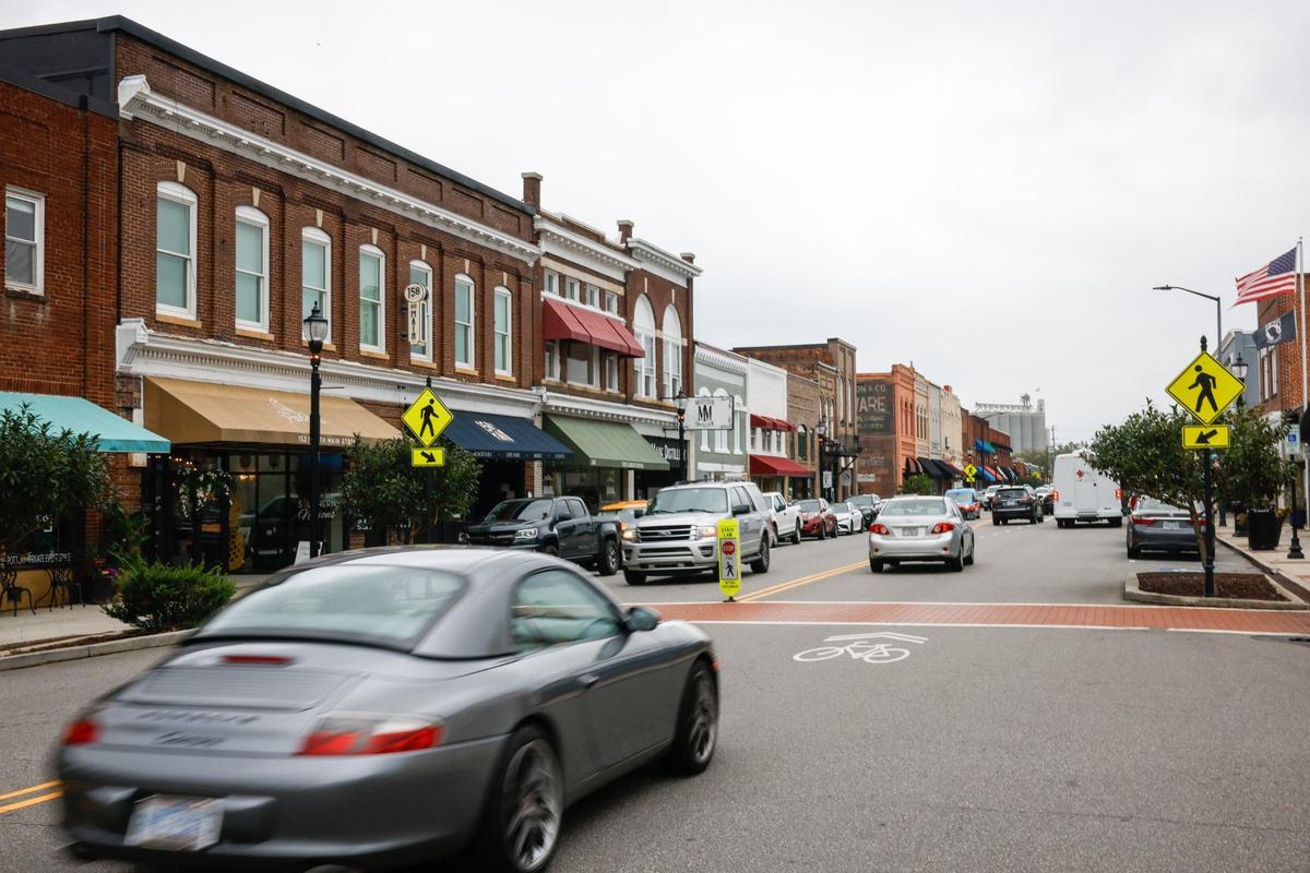 Main Street in downtown Mooresville is seeing more traffic as more housing development continues in the city itself, as well as in surrounding areas. The town has been hit the hardest among Lake Norman communities with exploding development and rapid growth that residents don’t want. They are trying their best to control growth, but people keep coming.