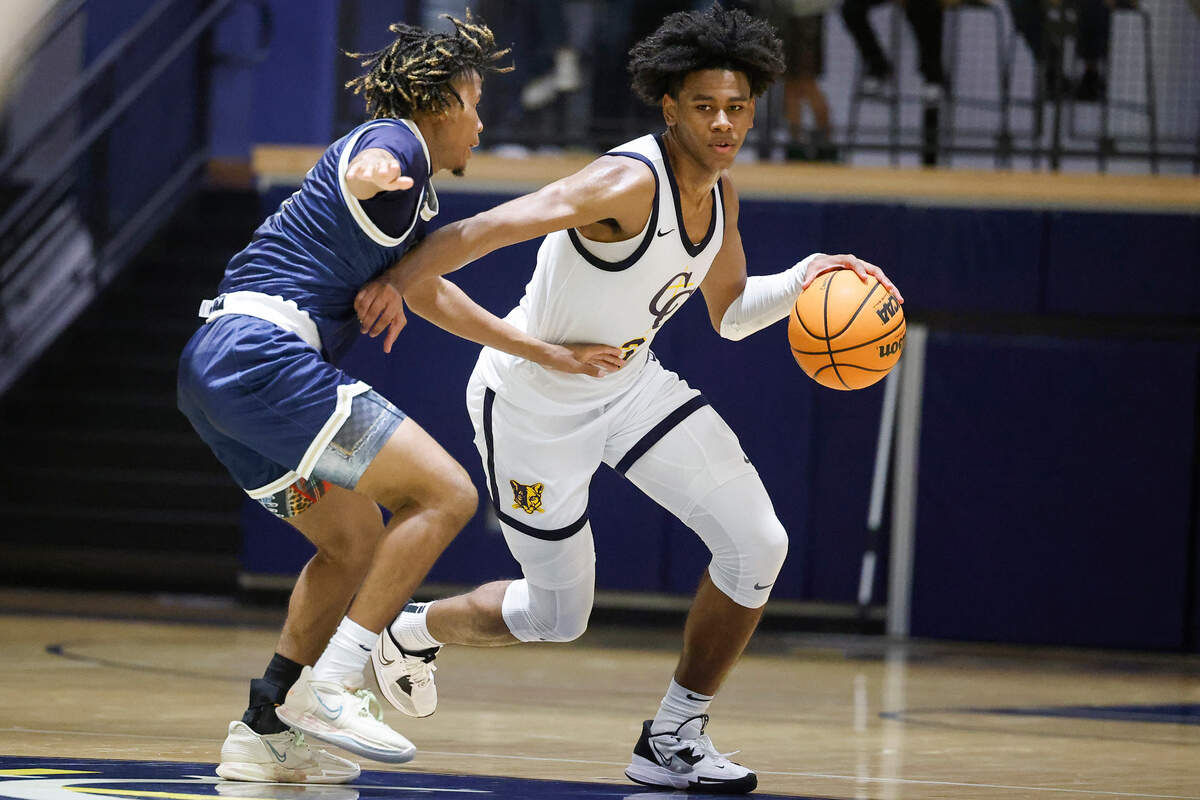 Carmel Christian’s Jaeden Mustaf (3) dribbles past Concord Academy’s Isaiah Tate (3) during a game at Carmel Christian in Matthews, N.C., Tuesday, Nov. 22, 2022. Carmel Christian beat Concord Academy 59-52