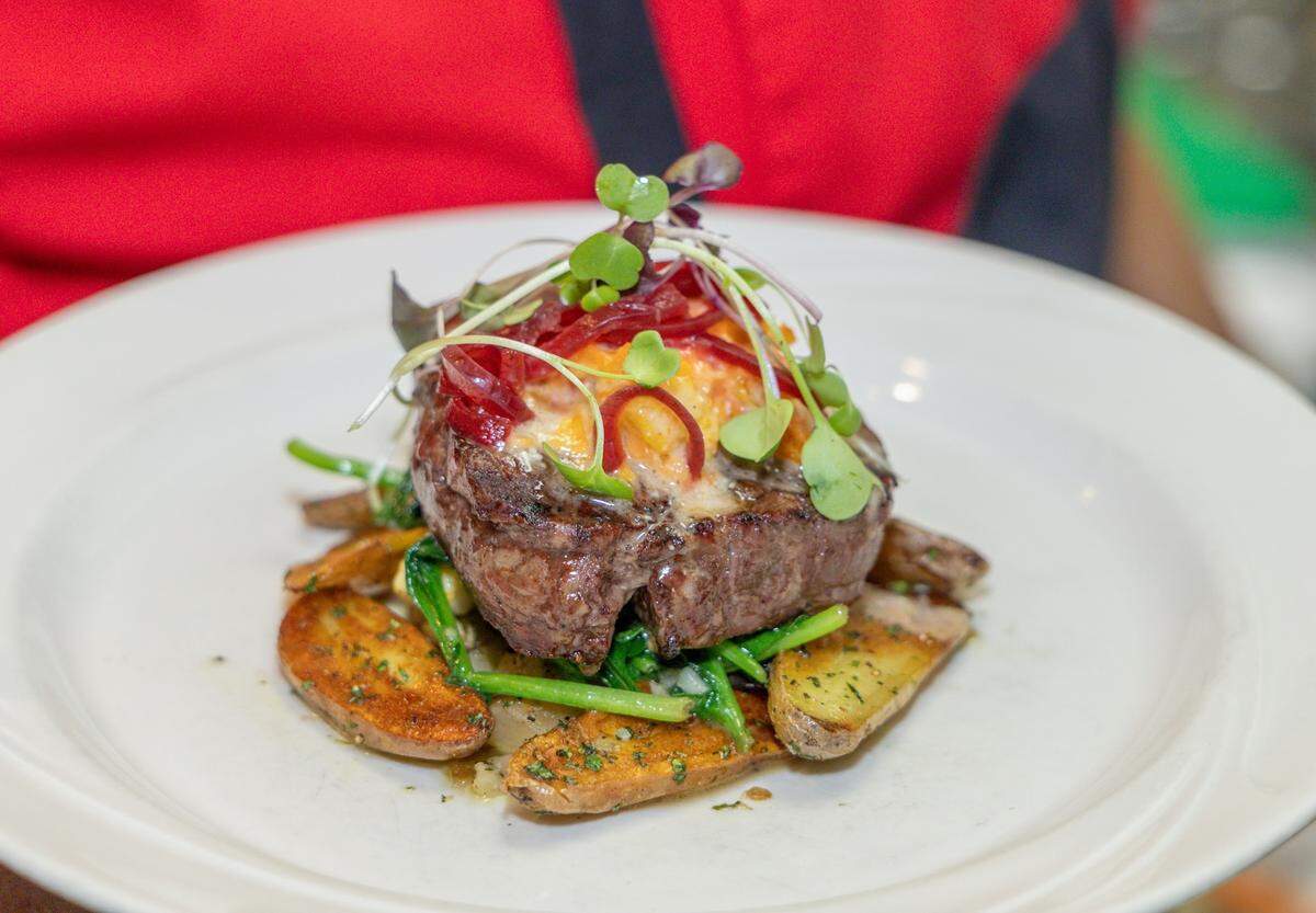 The filet mignon at Santé with roasted fingerling potatoes and oven-roasted tomato Parmesan butter.