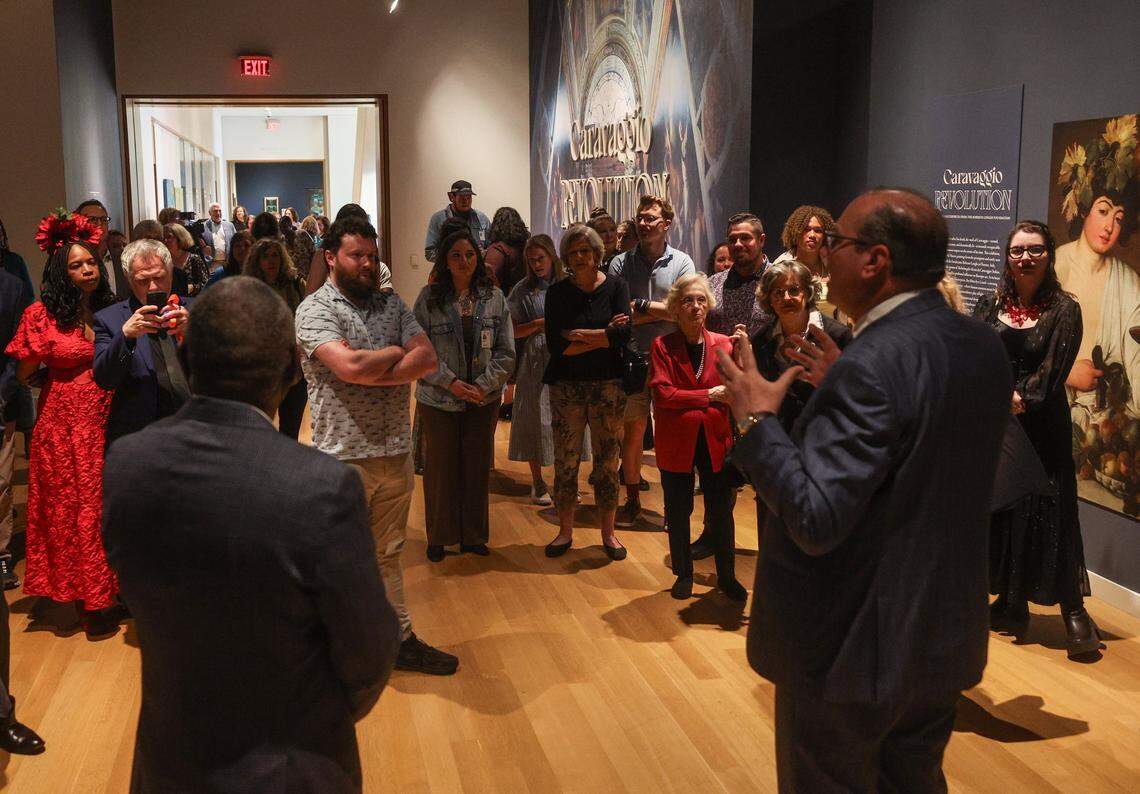 People listedn as the Mint Museum's CEO and President Todd Herman gives an overview of “Carvaggio | Revolution” Baroque Masterpieces” during a media preview on Thursday, April 23, 2026. Caravaggio's work will be on display from April 26 until October 25 at the Mint Museum in uptown Charlotte.