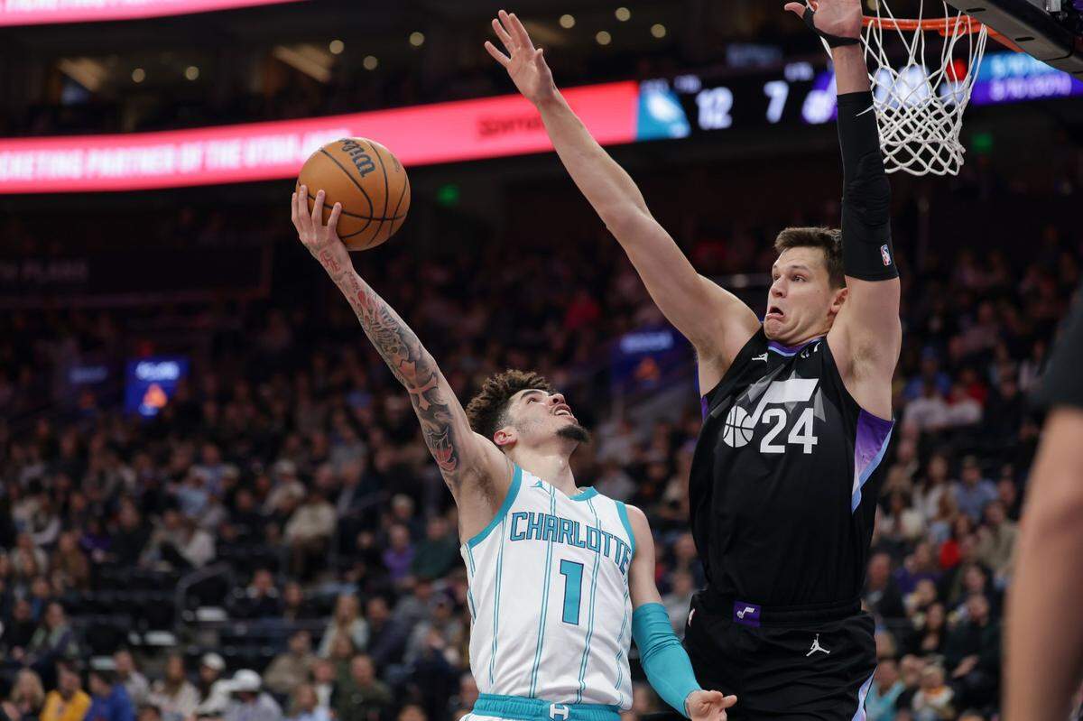 Charlotte Hornets guard LaMelo Ball (1) shoots against Utah Jazz center Walker Kessler (24) during the first quarter at Delta Center.