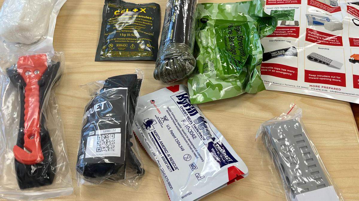 A collection of items inside of Charlotte-Mecklenburg Schools’ new Go Bags, which were handed out to about 11,000 employees. They include medical equipment to treat wounds and stop bleeding, a doorstop and a glass-breaking tool.