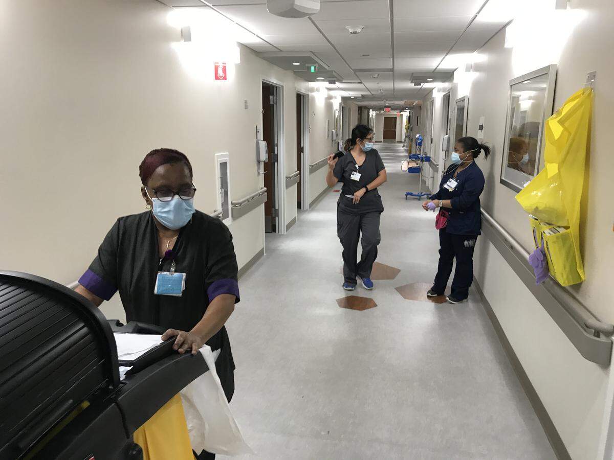 Jackie Clarke works the floor at Novant Health Presbyterian Medical Center.