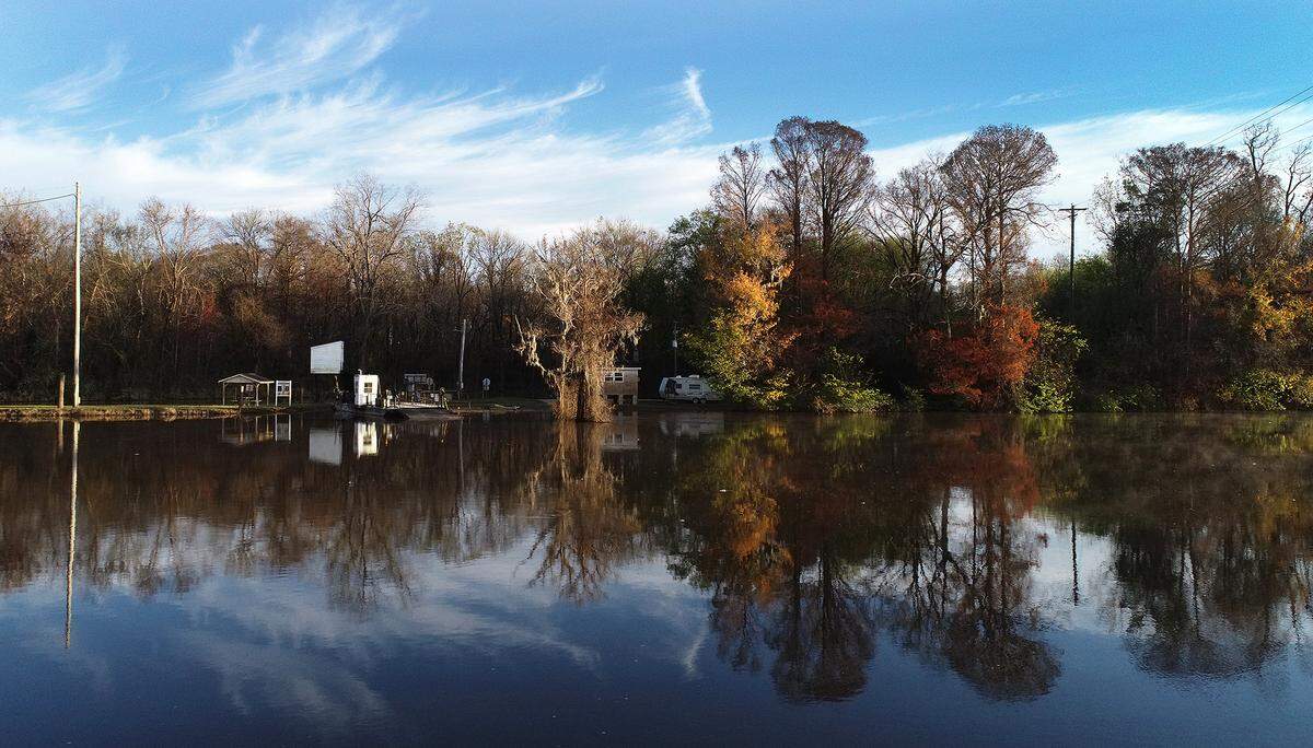 The Elwell Ferry, operating since 1905, is a cable ferry crossing the Cape Fear River in Bladen County. It connects the communities of Carvers Creek and Kelly in Bladen County.