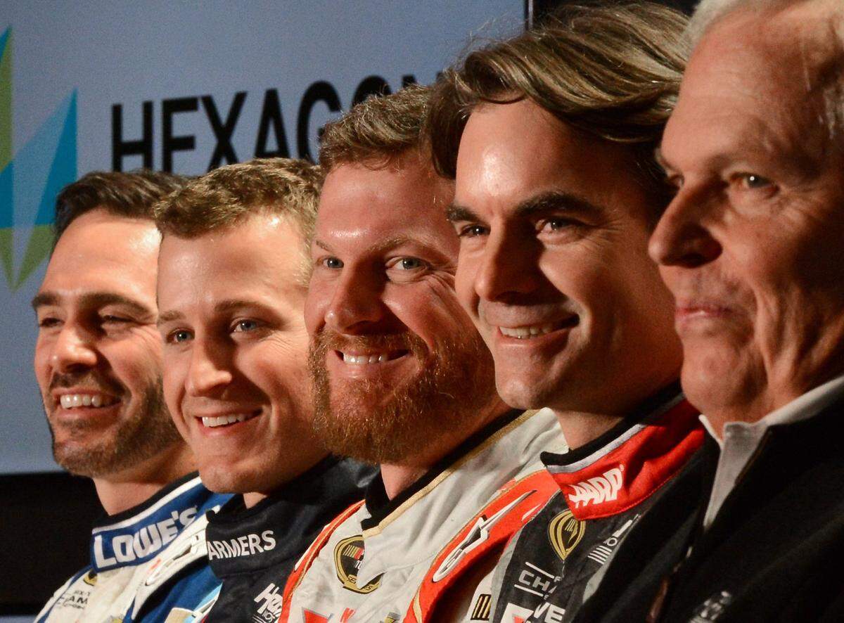 (L-R) NASCAR Sprint Cup Series drivers Jimmie Johnson, Kasey Kahne, Dale Earnhardt Jr., Jeff Gordon and team owner Rick Hendrick smile during a question and answer session at the NASCAR Sprint Cup Series Media Tour on Tuesday, January 28, 2014 at the Charlotte Convention Center in Charlotte, NC.