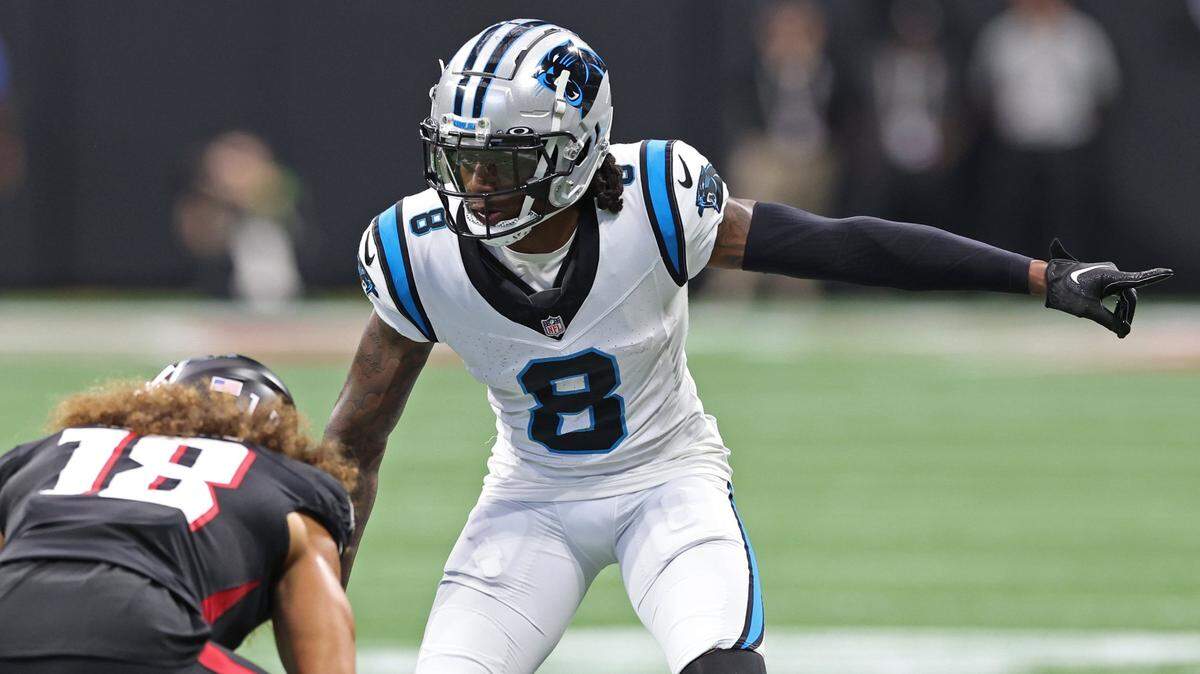 Carolina Panthers cornerback Jaycee Horn, right, lines up across from Atlanta Falcons wide receiver Mack Hollins, left, during action at Mercedes-Benz Stadium in Atlanta, GA on Sunday, September 10, 2023. Horn left with a hamstring injury before halftime.