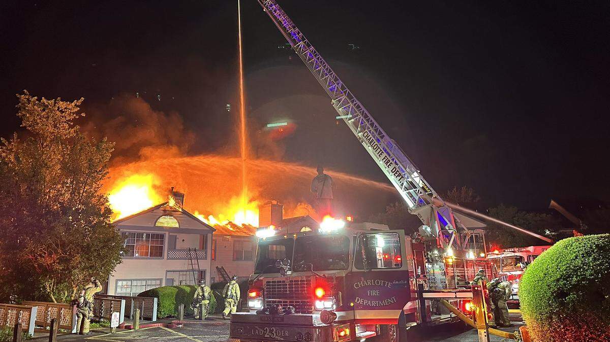 Firefighters respond to a two-alarm fire at an east Charlotte apartment building early Sunday, June 4, 2023.