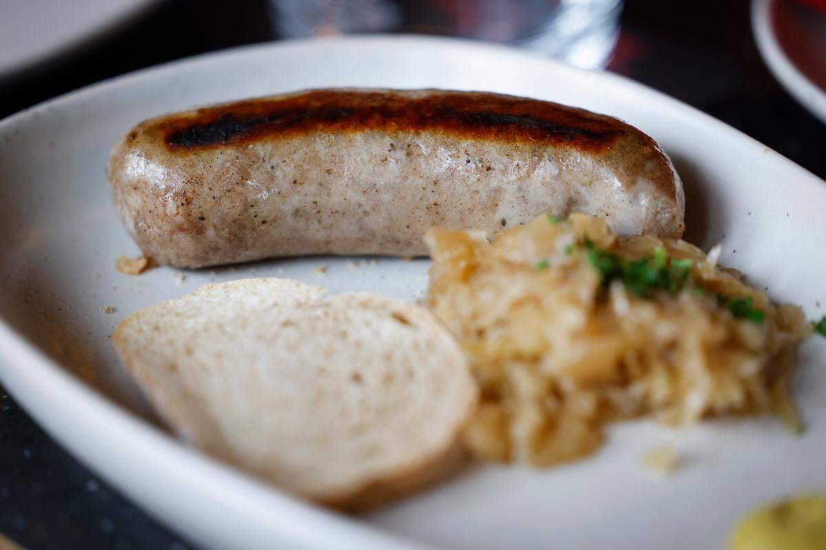 The bratwurst ($11) served with sauerkraut and German bread at Gilde Brewery in Charlotte is made by Bavaria Sausage Inc., based in Wisconsin.
