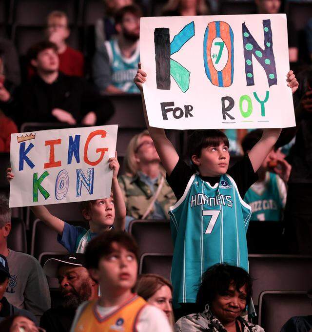 Young Charlotte Hornets fans wait for forward Kon Knueppel to run onto the floor prior to action against the Memphis Grizzlies at Spectrum Center in Charlotte, NC on Saturday, March 21, 2026. The Hornets defeated the Grizzlies 124-101.