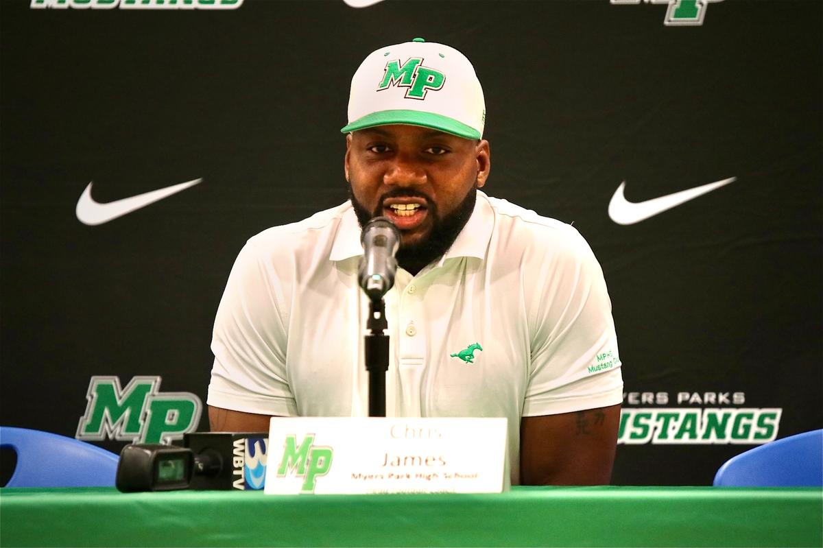 Myers Park High School rookie coach Chris James speaks at SoMECK 4A conference football media day at Palisades High School Saturday Aug. 5, 2023