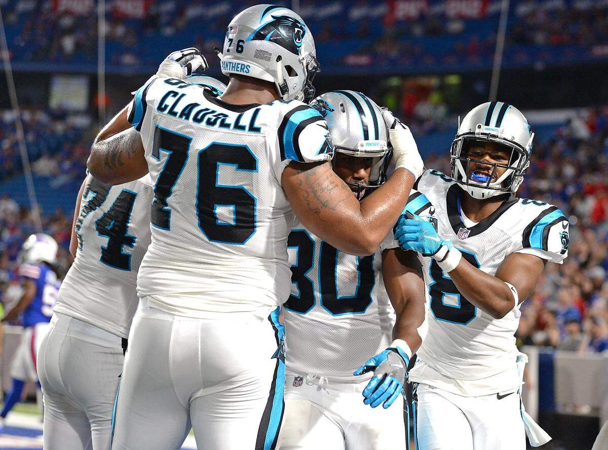 Carolina Panthers running back Elijah Hood is congratulated by his teammates after catching a touchdown pass during fourth quarter action against the Buffalo Bills in NFL exhibition action at New Era Field in Orchard Park, NY on Thursday, August 9, 2018.