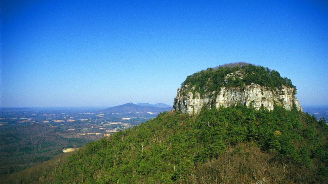 A Durham woman died Monday from a fall at Pilot Mountain State Park.