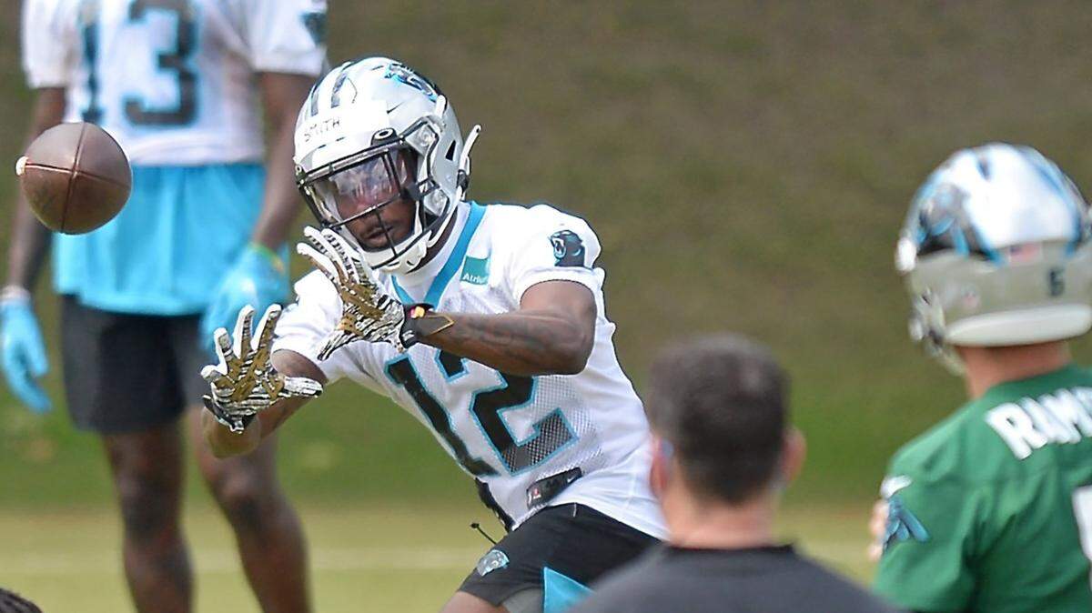 Panthers wide receiver Shi Smith (12) is facing drug and weapons charges.