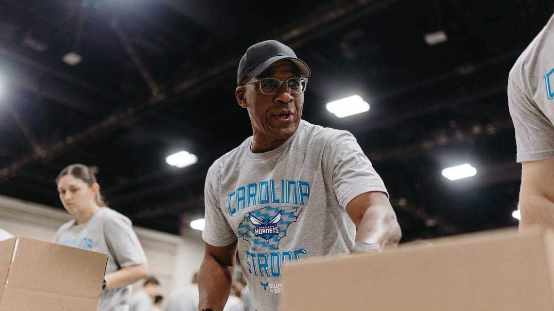 James Jordan, pictured here helping out with one of the Charlotte Hornets’ charitable efforts, is moving into an advisory role with the organization.