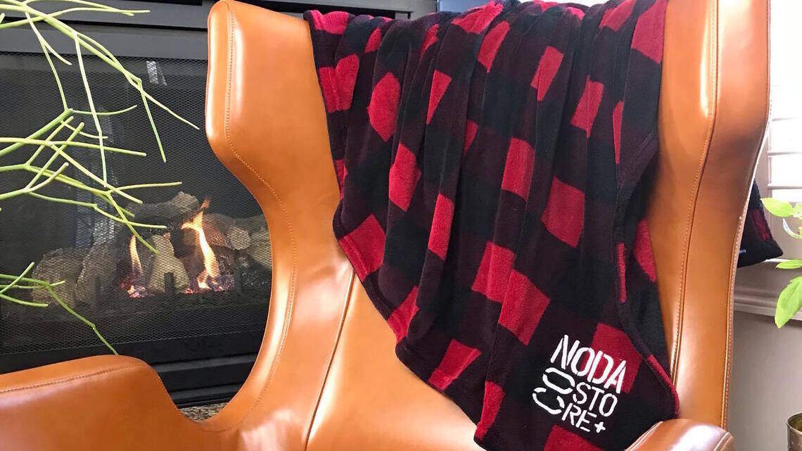 Beers, burgers and … blankets? Food spots are adding cold weather gear to the menu.