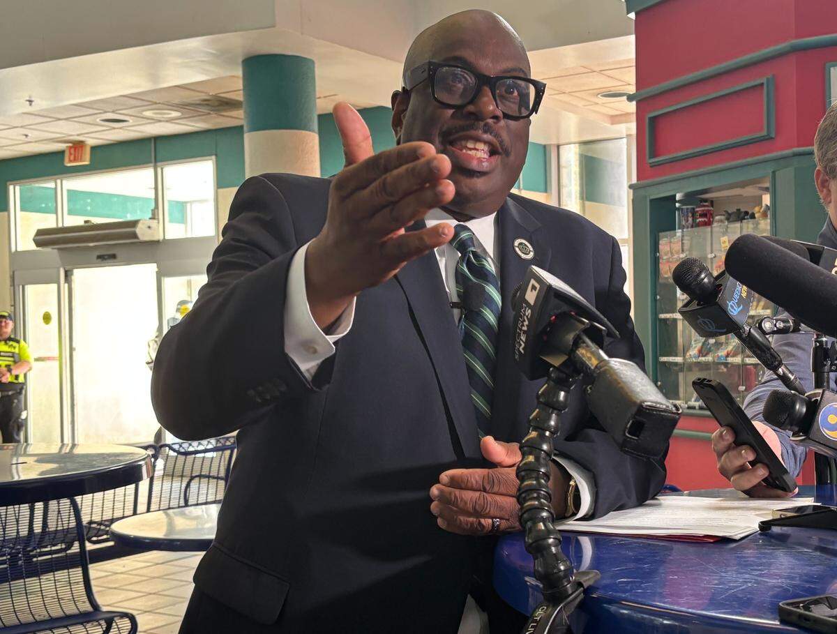 Charlotte City Council Member Malcolm Graham speaks from the Charlotte Transit Center in Uptown following a fatal stabbing on the city’s light rail.