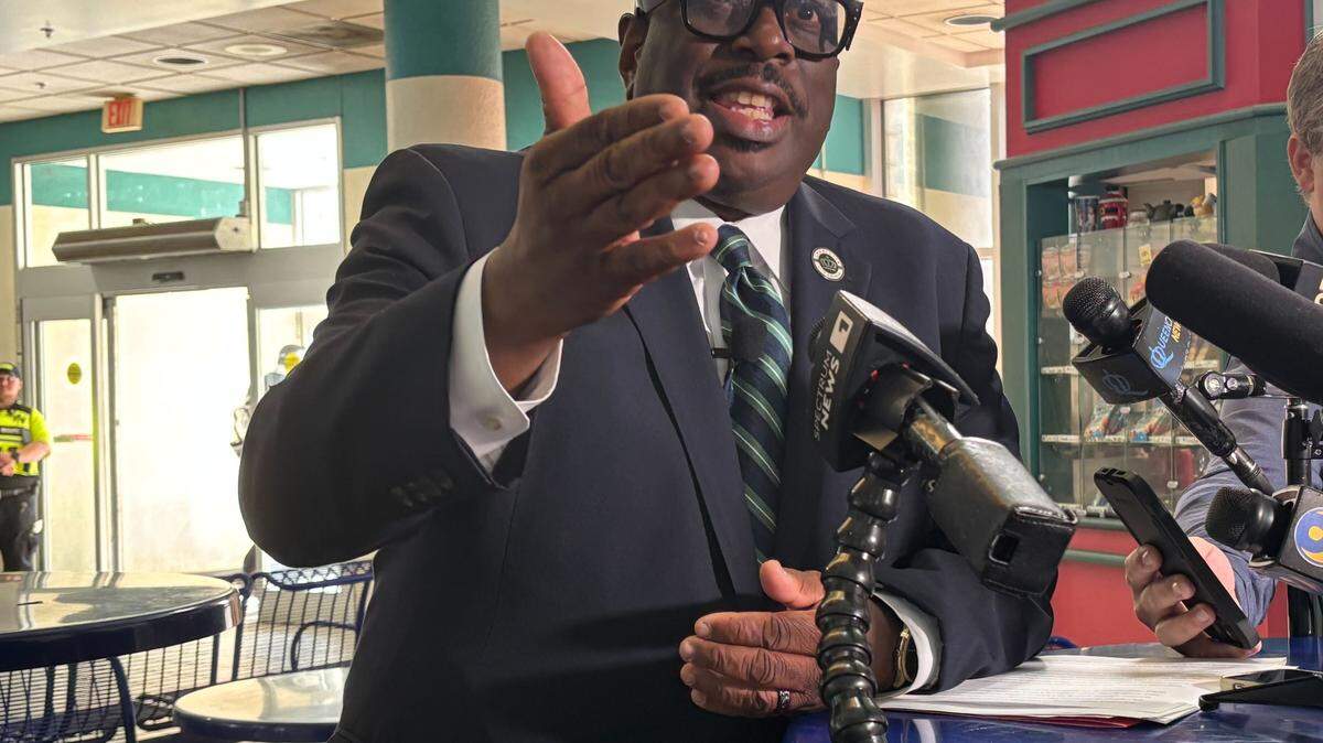 Charlotte City Council Member Malcolm Graham speaks from the Charlotte Transit Center in Uptown following a fatal stabbing on the city’s light rail.