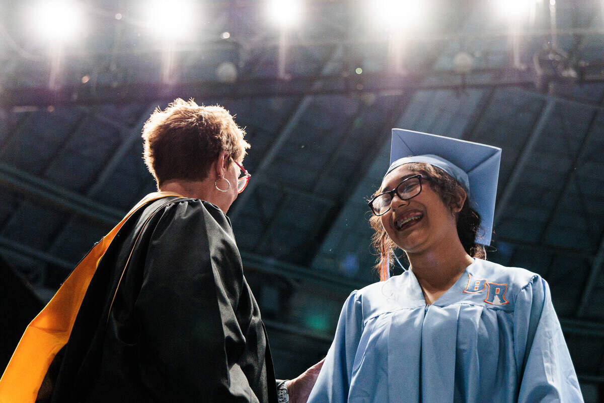 A Ballantyne Ride High School student is congratulated after receiving their diploma on Saturday, June 13, 2026 at the Bojangles Coliseum.