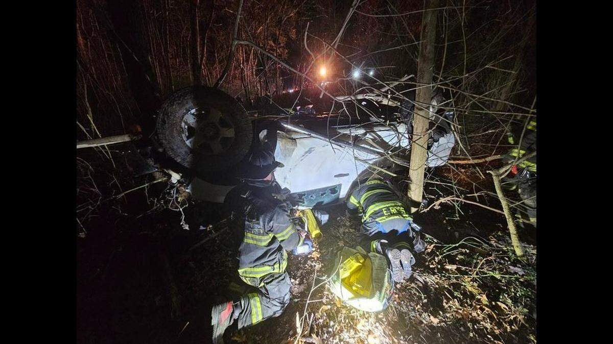 A mangled SUV found upside down along Interstate 77 north of Charlotte remains a mystery after searchers found no driver and no passengers, officials say.