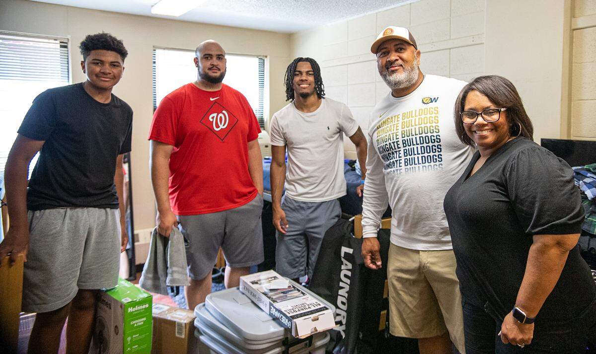 Kyle Honore (center) moved into his Wingate University dormitory with help from his family on Sunday, Aug. 14, 2022. Honore, a freshman from Virginia, died after being struck by a train in the Union County town on Tuesday night.