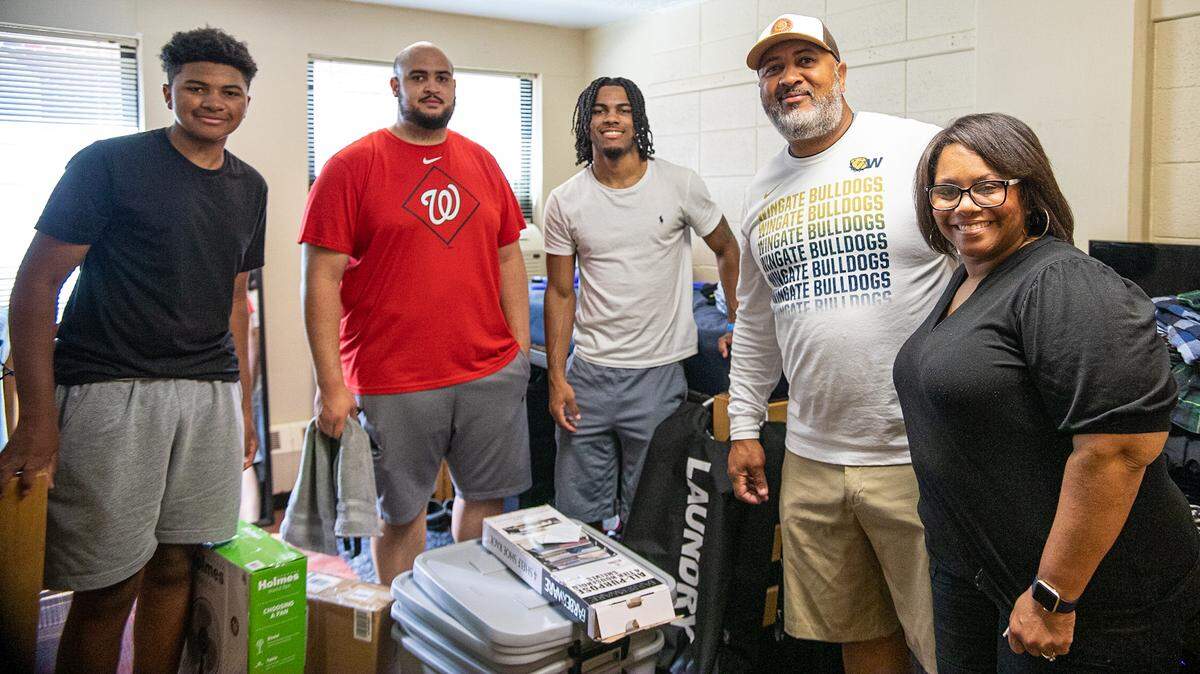 Kyle Honore (center) moved into his Wingate University dormitory with help from his family on Sunday, Aug. 14, 2022. Honore, a freshman from Virginia, died after being struck by a train in the Union County town on Tuesday night.