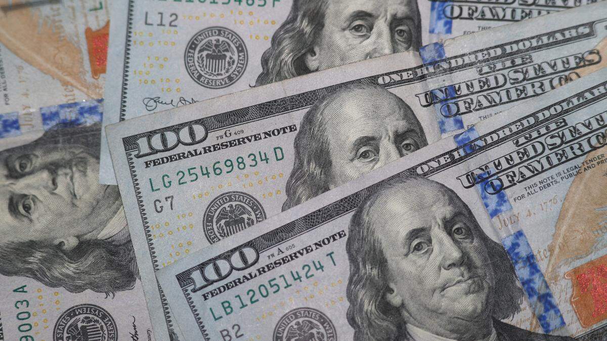 This Jan. 22, 2020, file photo shows the likeness of Benjamin Franklin on $100 bills in Dallas.