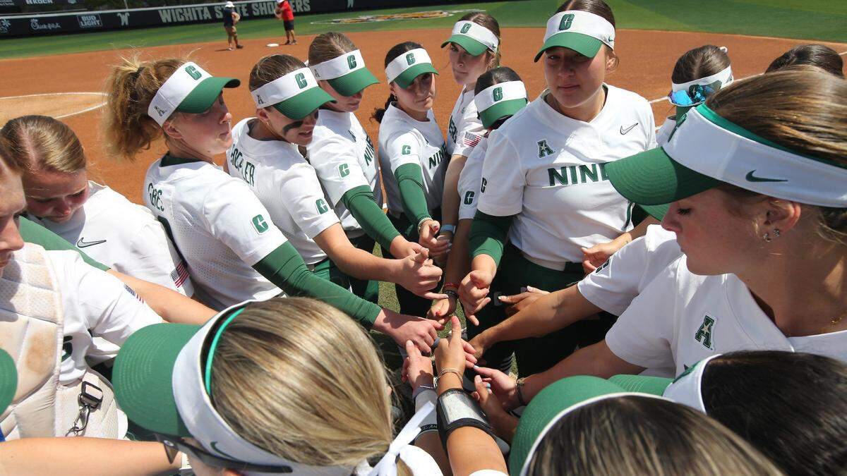 The Charlotte 49ers softball team prepares to play the AAC Championship game against Wichita State in Kansas on May 11, 2024.