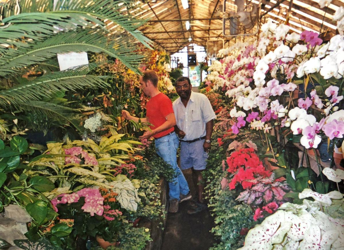 Campbell Greenhouse owner Jesse Campbell, right, was shot and killed at his house near Lake Wylie, SC on January 6, 2015. A new apartment complex is being named for the greenhouse. Campbell was beloved in the community but also had a controversial past.