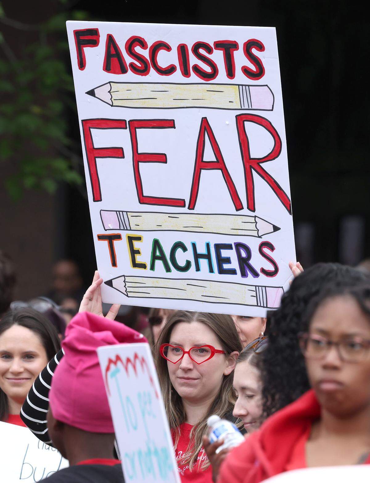 Signs, signs, signs were everywhere as teachers rallied at the Government Complex in Raleigh.