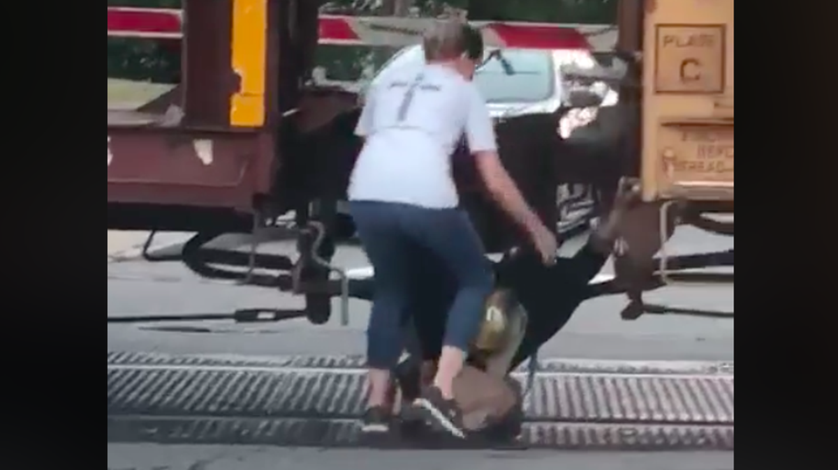 Gardner, Massachusetts, mom Jennifer Ringuette ran from her car to rescue a man who got his prosthetic leg trapped in the coupling of a stopped train. She credited God with putting her in place to help.