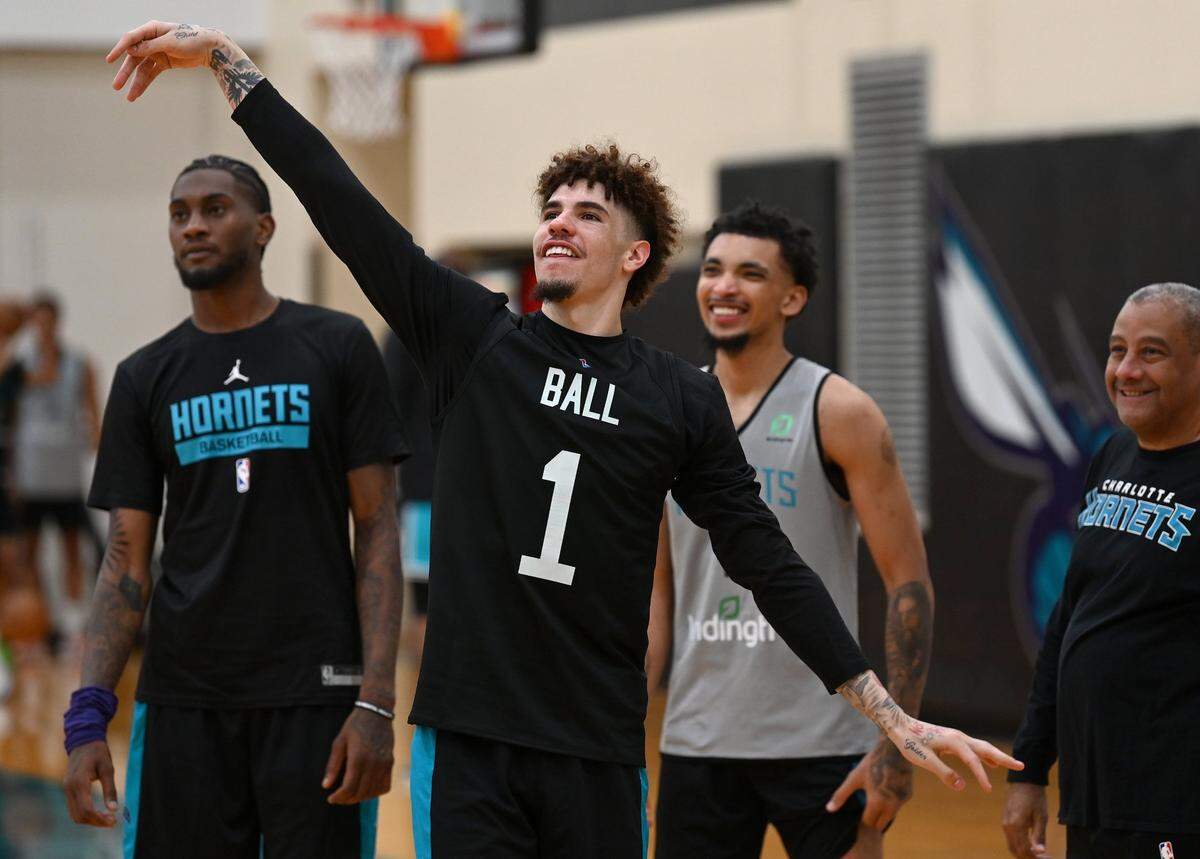 Charlotte Hornets guard LaMelo Ball maintains his release on a jump shot during an after practice shoot around on Tuesday, September 27, 2022.