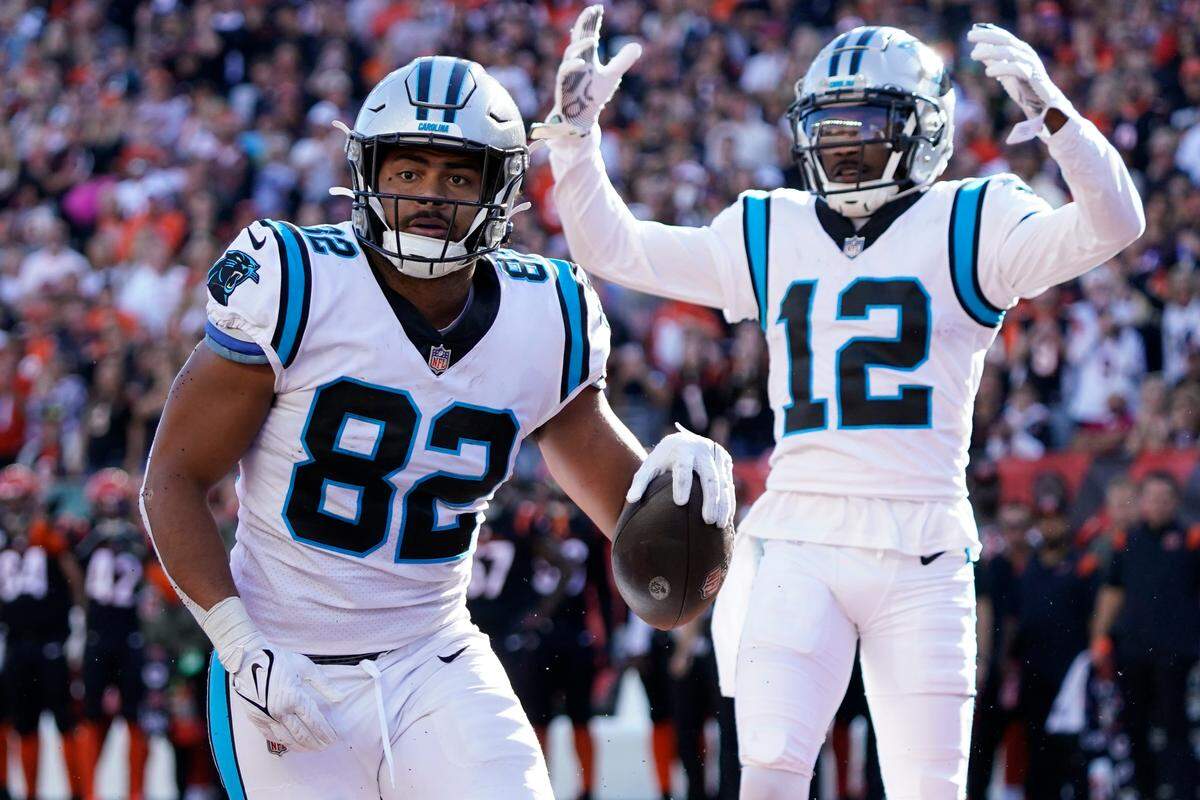 Carolina Panthers tight end Tommy Tremble (82) celebrates with wide receiver Shi Smith (12) after making a touchdown catch against the Cincinnati Bengals during the second half of an NFL football game, Sunday, Nov. 6, 2022, in Cincinnati. (AP Photo/Joshua A. Bickel)