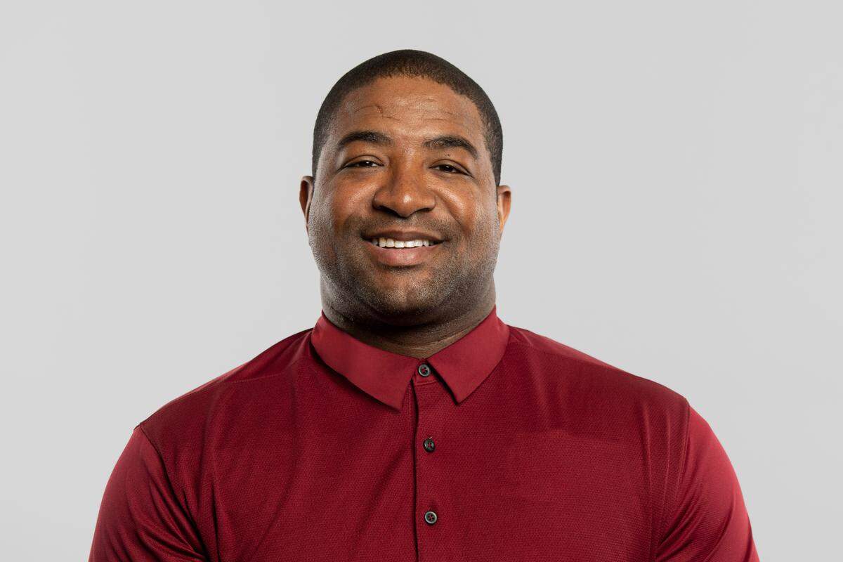 Sam Mills III worked for more than 15 years for his father’s old team, the Carolina Panthers. But when Ron Rivera became the new coach of the Washington Football Team in 2020, Mills joined him there as the defensive line coach.