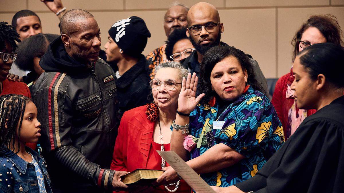Shamaiye Haynes, the newest board member for Charlotte-Mecklenburg Schools' District 2, is sworn in to her position surrounded by family and friends on December 9, 2025.