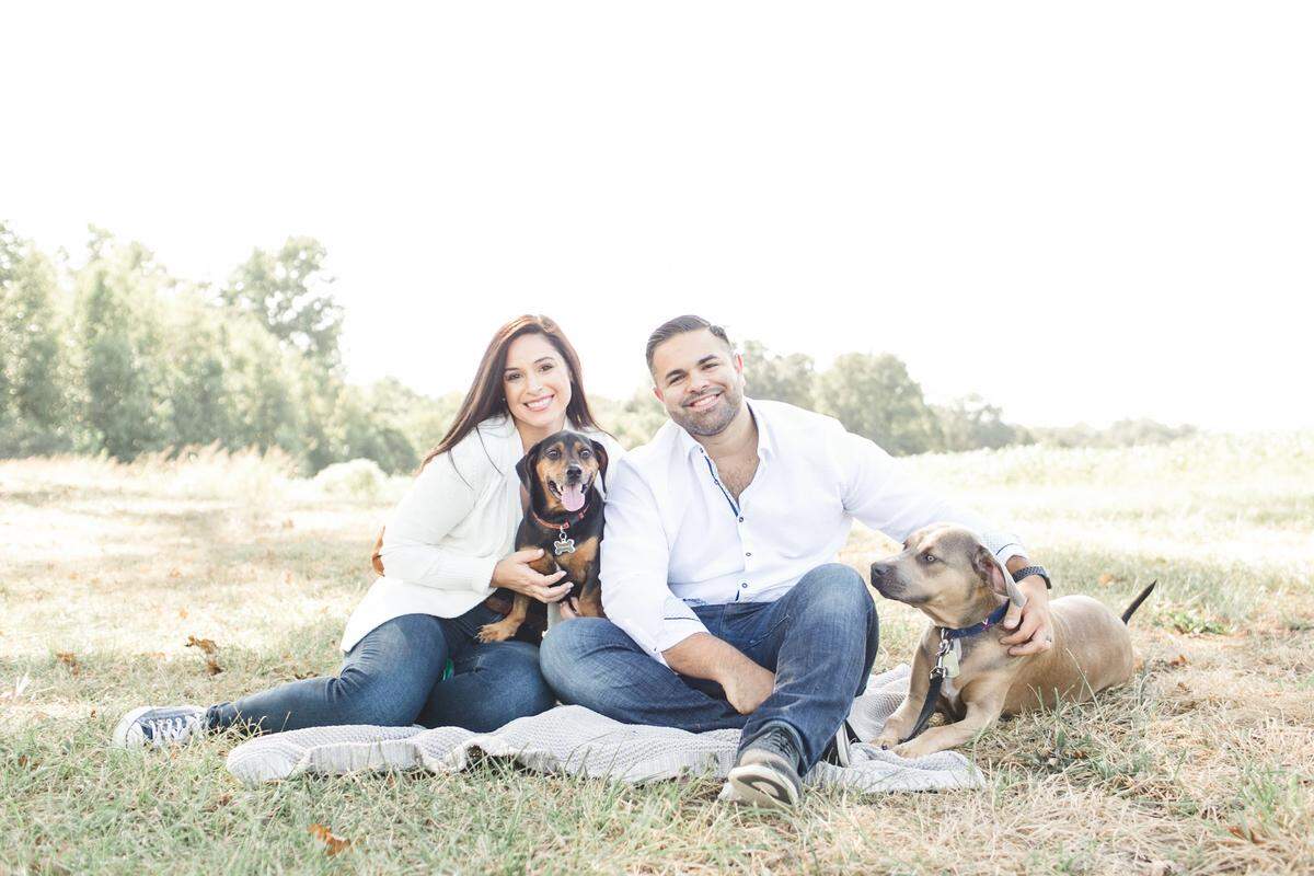 Petly creator Franco Valdes with his wife and rescue pups, Homer and Tripp.