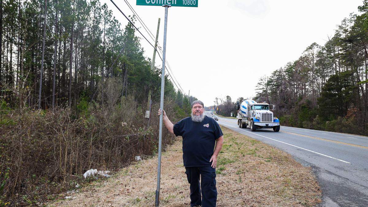 Mint Hill resident Jeff Miller stands at the intersection of Blair Road and Connell Road. Miller lives close to where an Atlanta developer is proposing a roughly 500,000 square foot industrial park. He worries the prospect of added truck traffic through a mostly residential area will make the roads more dangerous.